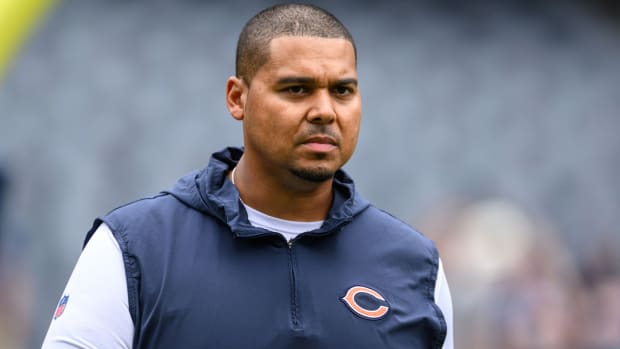 Ryan Poles looks ahead as he walks on the field